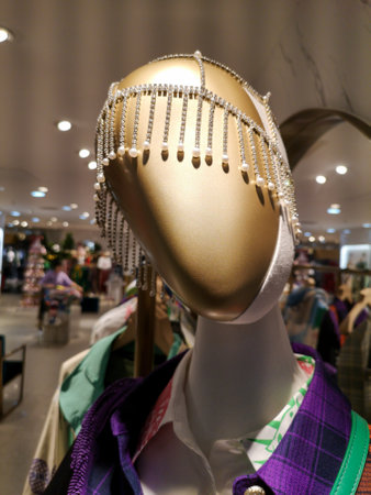 Sanya, Hainan Island, China - January 12, 2020: Mannequin with clothes on a shop window.のeditorial素材
