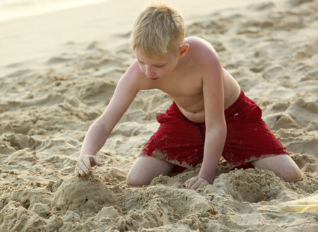 Sanya, Hainan Island, China - January 8, 2020: Children on the beach in Dadonghai Bay.のeditorial素材