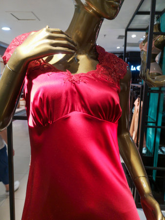 Sanya, Hainan Island, China - January 12, 2020: Mannequin with clothes on a shop window.のeditorial素材