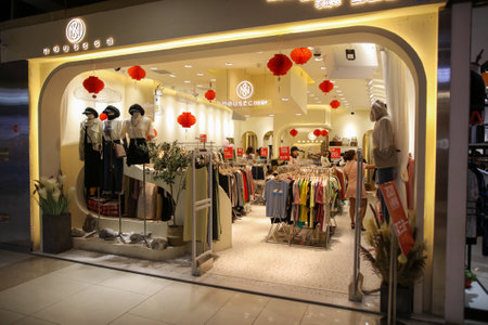 Sanya, Hainan Island, China - January 12, 2020: Mannequin with clothes on a shop window.