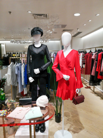 Sanya, Hainan Island, China - January 12, 2020: Mannequin with clothes on a shop window.のeditorial素材