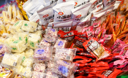 Sanya, Hainan Island, China - January 14, 2020: Sweets and sweets in packages in the Chinese market.のeditorial素材
