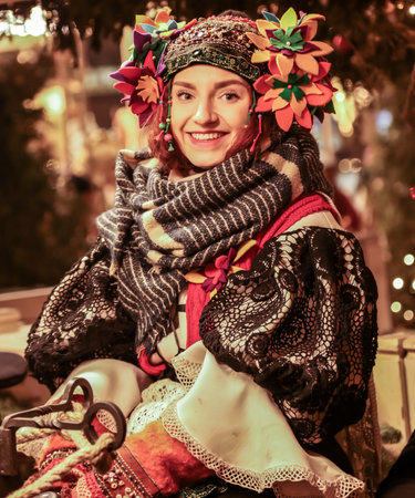 Moscow, Russia - January 16, 2020: Girl in a Polish national costume in the city at night.