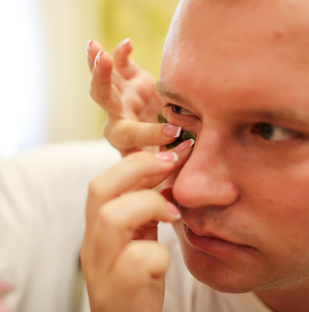Sanya, Hainan Island, China - January 14, 2020: Russian man with tea leaves on his face.のeditorial素材