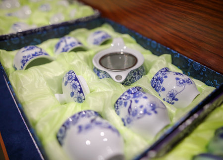 Sanya, Hainan Island, China - January 14, 2020: Chinese porcelain dishes for tea at the store shelves.のeditorial素材