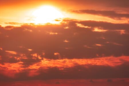 Colorful clouds at dawn of the sun.