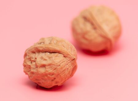 Walnuts on a pink background. Foodの写真素材