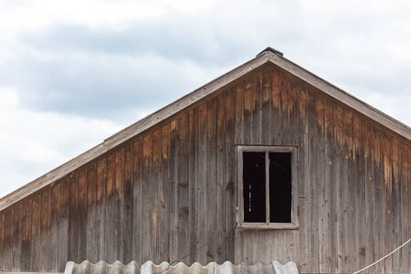 Old wooden boards on the roof of the house. Old buildingsの写真素材