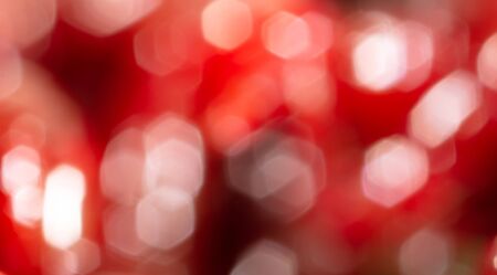 Festive red bokeh as an abstract background. Textureの写真素材