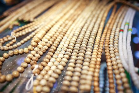 Pearl beads on a counter in a shopping center.の写真素材