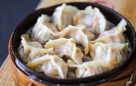 Chinese manti on a table in a cafe.の写真素材