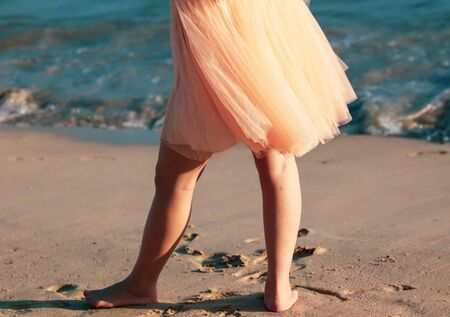 Pink fabric on a dress in the wind as a background.