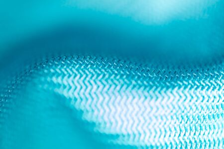Blue fabric as an abstract background. Texture