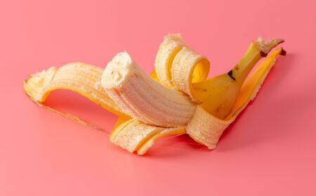 Banana is isolated on a pink background. Tropical fruit.の写真素材