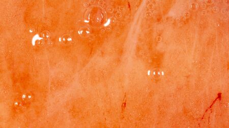 Red trout fish meat as abstract background. Macro