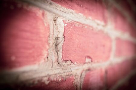 Old red bricks in the wall. Abstract background .の写真素材