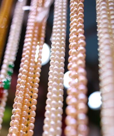 Pearl beads on a counter in a shopping center.の写真素材