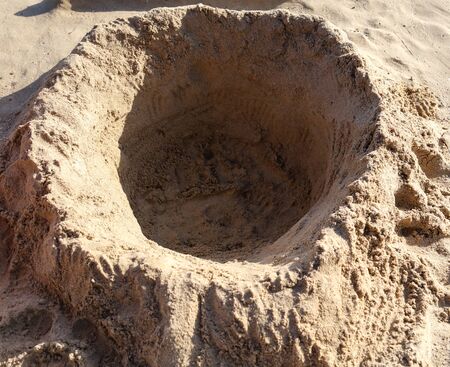 Sand pit on the beach near the sea. Rest at the resort.の写真素材