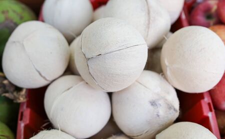 White fruit on the counter in the market. Exotic fruit in the tropics.