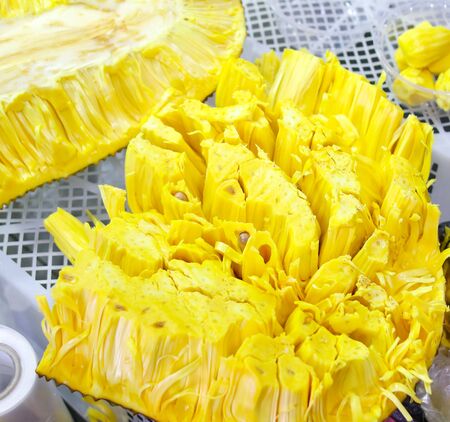 Jack fruit cut in the market. Exotic fruit in the tropics.