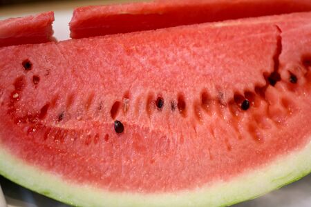 Ripe watermelon on the counter in the market. Big berry