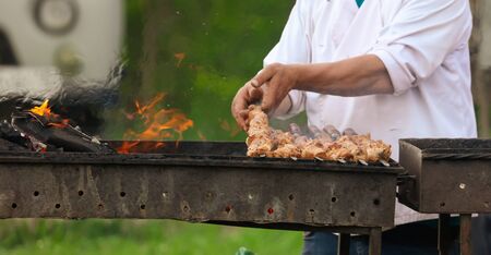 The meat on skewers is fried on the grill. Kebabの写真素材