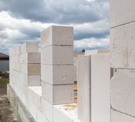 The process of building a house from foam concrete bricks. Technology