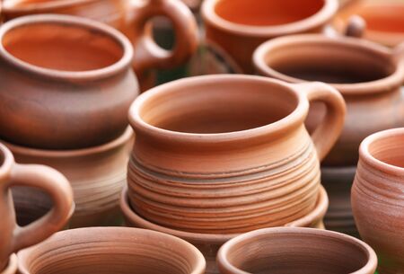 Clay dishes on a counter in the market.の写真素材
