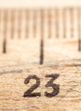 Close up of the number twenty three on a wooden ruler. Macroの写真素材