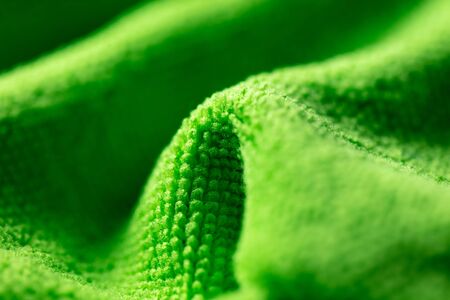 Green fabric as an abstract background. Texture