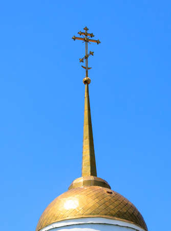 Orthodox cross on the temple against the blue sky. Religionの写真素材