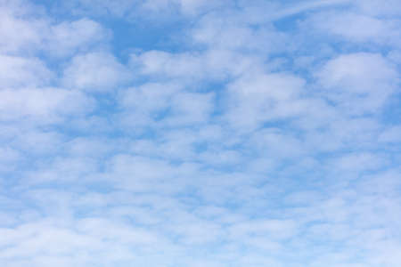 White clouds on a blue sky as abstract background.の写真素材