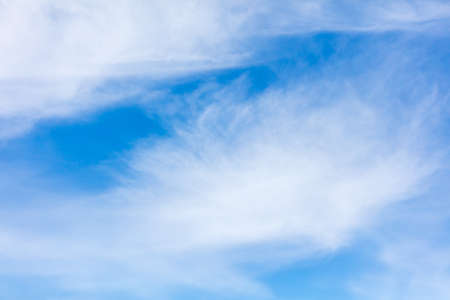 White clouds on a blue sky as abstract background.