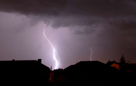 Lightning struck the house as an abstract background.の写真素材