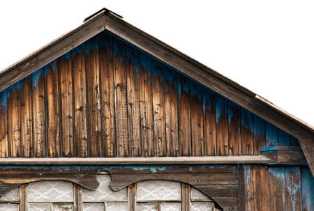 Old wooden boards on the roof of the house. Old buildings