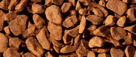 Close up of instant coffee granules as background. Macro