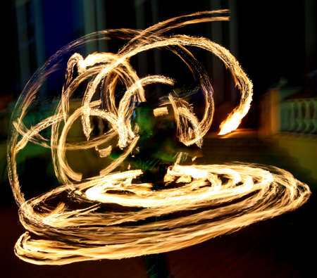 Flame of fire in motion at night. Abstract background