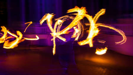 Flame of fire in motion at night. Abstract backgroundの写真素材