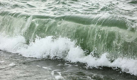 Wave in the sea with splashing water. Abstract background