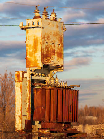 Rusty metal power plant in nature in autumn.の写真素材