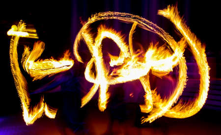 Flame of fire in motion at night. Abstract backgroundの写真素材