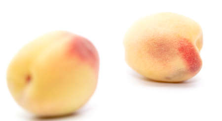 Ripe peach isolated on a white background. Close-upの写真素材