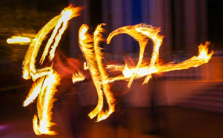 Flame of fire in motion at night. Abstract background