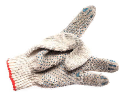 Worker dirty gloves isolated on white background.