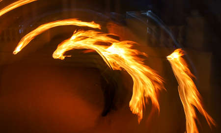 Flame of fire in motion at night. Abstract background