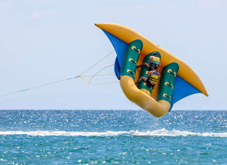 People took off at speed into the sky. Water attractionの写真素材