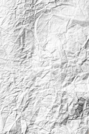 Crumpled white paper as an abstract background. Textureの写真素材