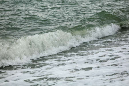 Wave in the sea with splashing water. Abstract background