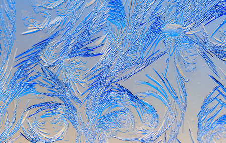 Natural pattern on glass at dawn of the sun. Abstract background