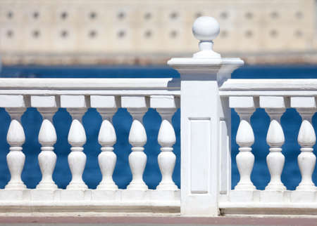 White concrete railing by the sea as background.の写真素材